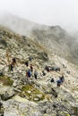 Crowds of tourists heading up to the popular Rysy peak. Tatra Mountains.