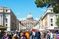 Crowds of tourists walk around the Cathedral of St. Peter in Rom Royalty Free Stock Photo