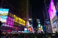 crowds and traffic at night in Time Square