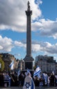 Crowds waving Israeli flags at pro-Israel rally in Trafalgar Square, central London, calling on Hamas to release the hostages.