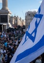 Crowds waving Israeli flags at pro-Israel rally in Trafalgar Square, central London, calling on Hamas to release the hostages.