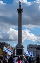 Crowds waving Israeli flags at pro-Israel solidarity rally at Trafalgar Square in London, UK Royalty Free Stock Photo