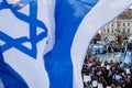 Crowds waving Israeli flags at pro-Israel rally in Trafalgar Square, central London, calling on Hamas to release the hostages.