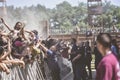 Crowdsurfing during a concert at a summer festival