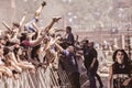 Crowdsurfing during a concert at a summer festival