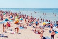 Crowdy beach sunny day by the sea, crowds of people.Blue sky hot summer day.Palanga-Lithuania,June 27-2020