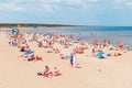 Crowdy beach sunny day by the sea, crowds of people.Blue sky hot summer day.Palanga-Lithuania,June 27-2020