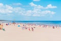 Crowdy beach sunny day by the sea, crowds of people.Blue sky hot summer day.Palanga-Lithuania,June 27-2020