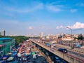 A crowdy image of Bangladesh at the peak hour with a lot of vehicles and people.