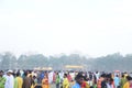 crowed of people playing holi with colors and gulal in a ground Royalty Free Stock Photo