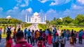 Crowed of people and visitors arrive in the Taj Mahal in sunset time. High crowds gathered in Taj Mahal in holiday weekends. Agra