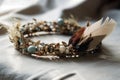 Crown Adorned With Feathers And Gemstones, Capturing Bohemian Flair Against Pristine White Surface. Generative AI