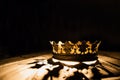 Crown of the real king on a black background. Battle for the Throne