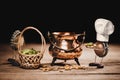 Crown cork miniature figures with hop cones, barley and a brewing copper kettle, brewing beer Royalty Free Stock Photo