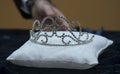 Crown or coronet on a white pillow Royalty Free Stock Photo