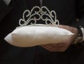 Crown or coronet on a white pillow Royalty Free Stock Photo