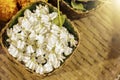 Crown flowers or giant indian milkweed in a basket