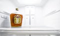 Crown Royal, in an empty refrigerator.