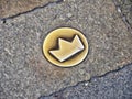 Crown symbol on the street in Bratislava, Slovakia