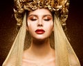 Crown Woman Golden Make up. Fashion Girl Portrait with closed Eyes. Bridal Gold Eye shadow and Lipstick Make-up. Black background Royalty Free Stock Photo