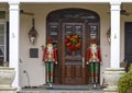 Crowned and bearded Nutcrackers standing guard protecting a house in Dallas, Texas