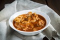 Crubeens with tomato sauce and bread