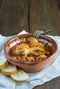 Crubeens with tomato sauce and bread