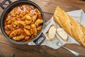 Crubeens with tomato sauce and bread Royalty Free Stock Photo