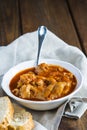 Crubeens with tomato sauce and bread