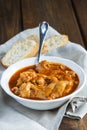 Crubeens with tomato sauce and bread