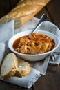 Crubeens with tomato sauce and bread Royalty Free Stock Photo