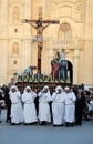 Crucified jesus carried by a team of ten porters Royalty Free Stock Photo