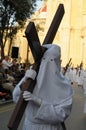 Crucifix bearer in the good friday procession Royalty Free Stock Photo