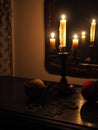 Crucifix and candles in the dark Royalty Free Stock Photo