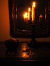 Crucifix and candles in the dark Royalty Free Stock Photo