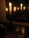 Crucifix and candles in the dark Royalty Free Stock Photo