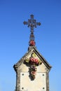 Crucifix with ceramic flowers