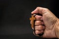 The crucifix is in the hands of a man who is praying for the blessing of his god with faith Royalty Free Stock Photo