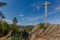 A crucifix with Jesus Christ on a rock