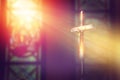 Crucifix, jesus on the cross in church with ray of light. Royalty Free Stock Photo