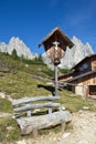 Crucifix next to the cottage Rifugio Citta di Carpi, Dolomites in South Tyrol