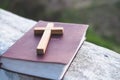 The crucifix is placed in the middle of the Bible. The idea of asking blessings from God with the power and power of holiness,