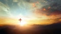 The crucifix symbol of Jesus on the mountain sunset sky background Royalty Free Stock Photo