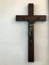 Crucifix On Wall In Spotlight. Jesus Christ On Cross. Religion, Belief And Hope.