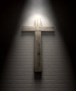 Crucifix On A Wall Under Spotlight