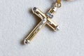 Crucifix in yellow gold Royalty Free Stock Photo