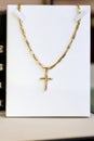 Crucifix in yellow gold Royalty Free Stock Photo