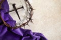 Crucifixion Of Jesus Christ. Cross With three Nails And Crown Of Thorns on ground Royalty Free Stock Photo