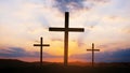 Crucifixion of Jesus Christ at dawn - three crosses at sunset. Three crosses stand in a field on a beautiful sky with rays and Royalty Free Stock Photo