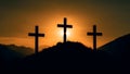 crucifixion, religion and christianity concept - silhouettes of three crosses on calvary hill on golden suset sky background,